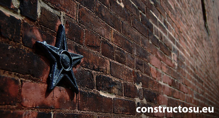 Ancoră perete cărămidă cu stea sau floare de fontă